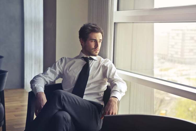 Man Wearing White Dress Shirt And Black Necktie 716411 (1)